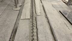 The Railway track of the Jungfraubahn with the teeth for the gear wheel in the middle of the track.