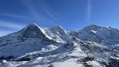 This picture has been taken from the top of Männlichen. Eiger North face, Mönch and Jungfraujoch.