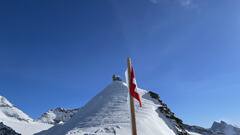 This picture has been taken on the Jungfrau plateau. And up there is the Sphinx which houses an Observatory.