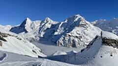 Eiger, Mönch and Jungfrau. This picture has been taken on the red slope underneath Birg next to the Ski lift Kandahar.