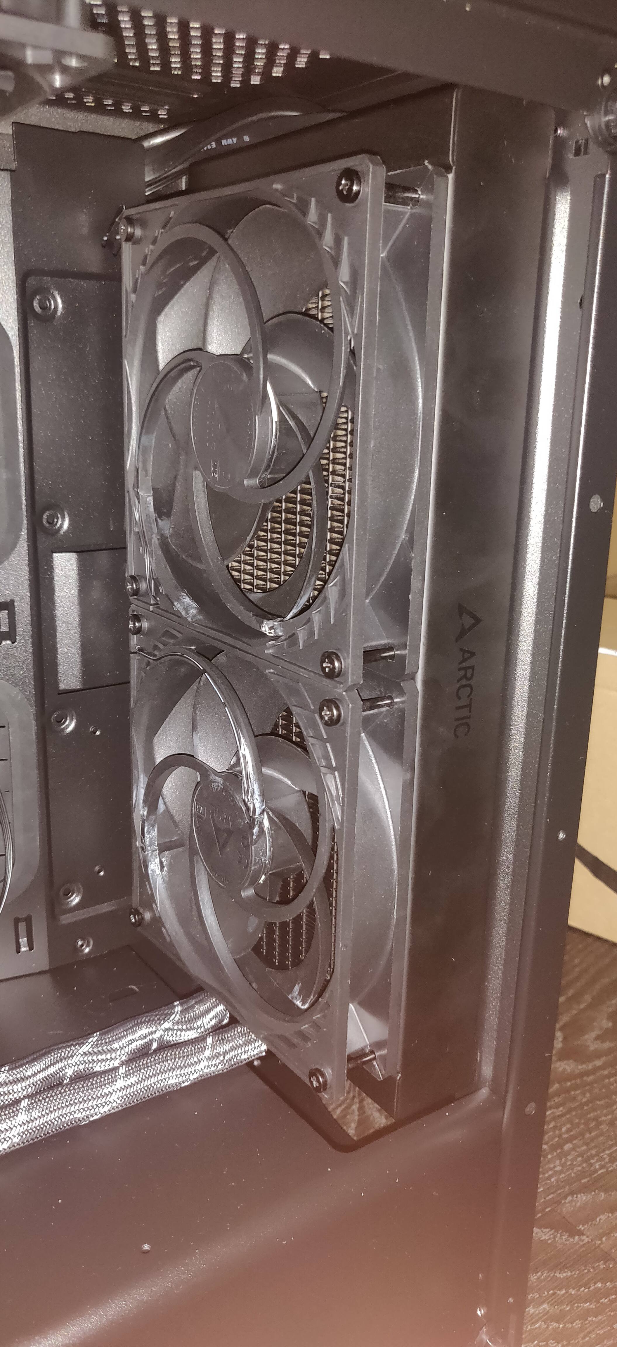 How can I keep my AIO tubes from hitting my top fan? : r/Corsair