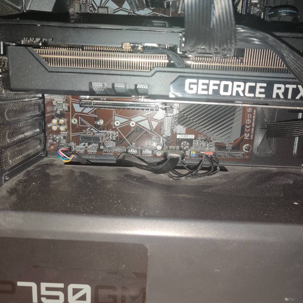 PSU makes clicking noises when I try and start up my PC Power